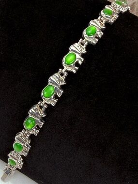 Silvertone Elephant Bracelet with Green Accents